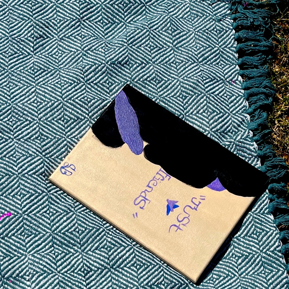 Tan purple and black painting